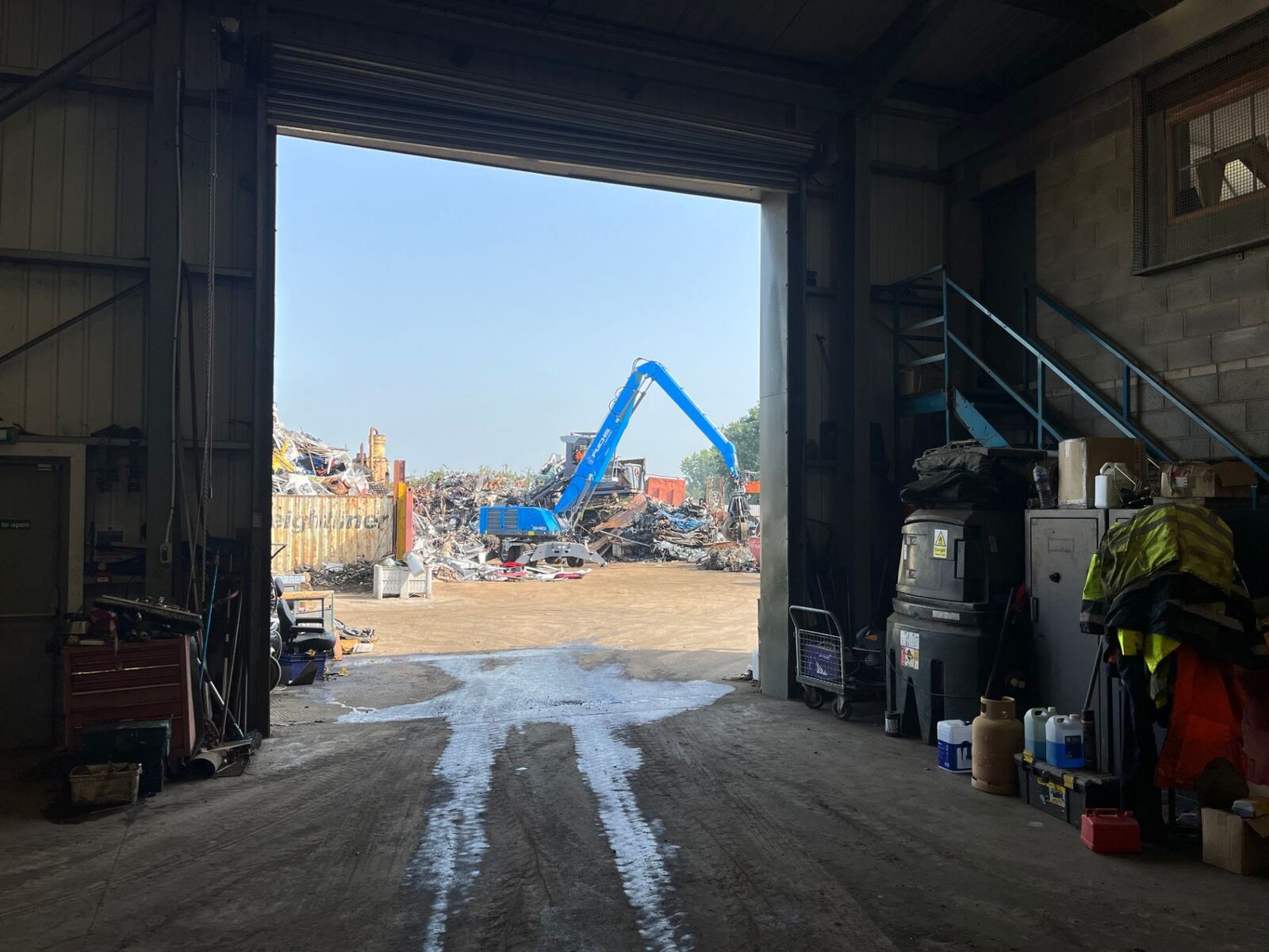 View from the workshop doorway out into the scrap yard