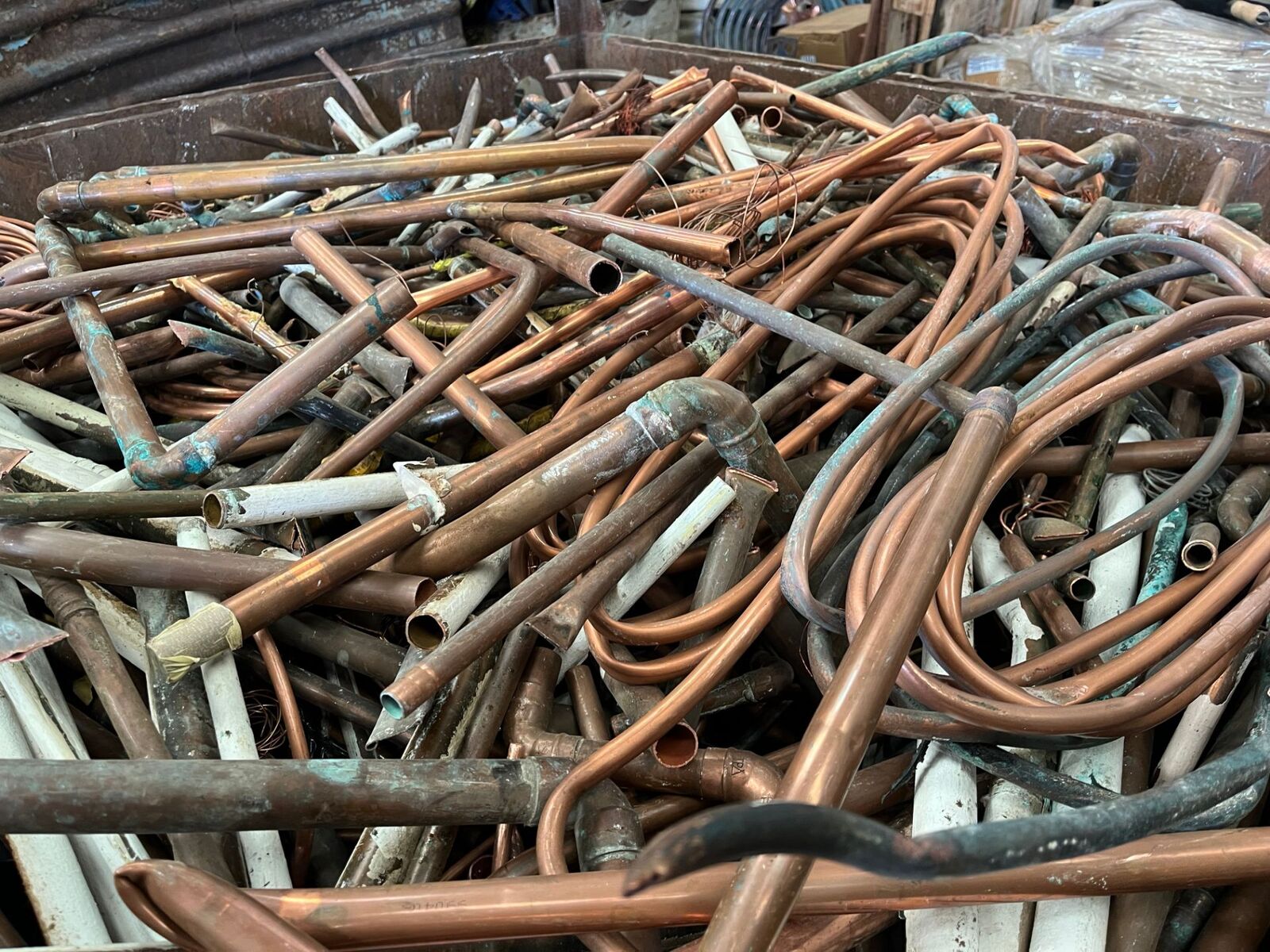 Pile of scrap copper pipe and tube