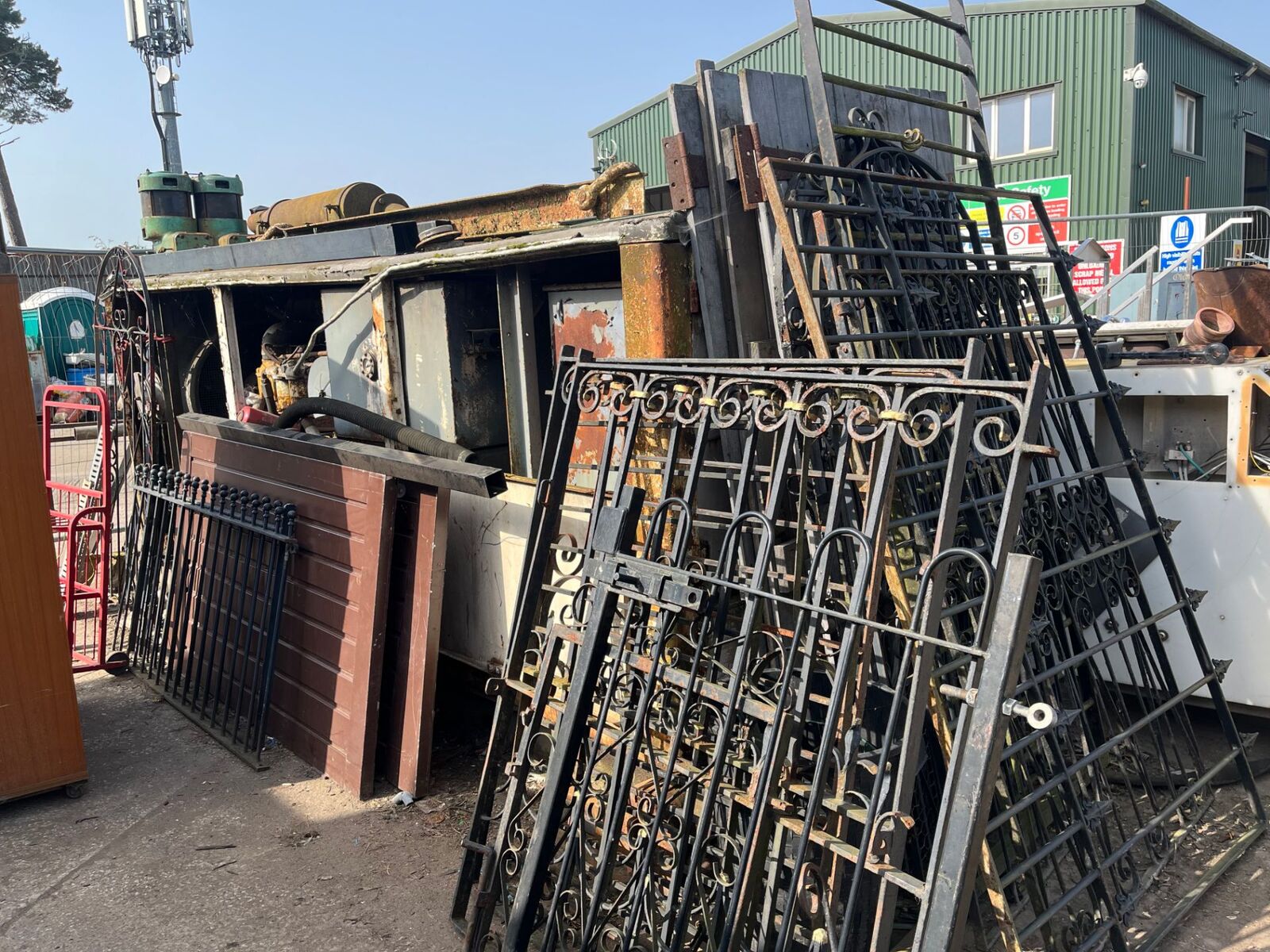 Wrought iron gates and railings stacked for recycling